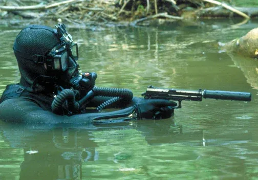 4-Mark-23-Navy-SEAL-mangrove-AUG-19-2014.webp